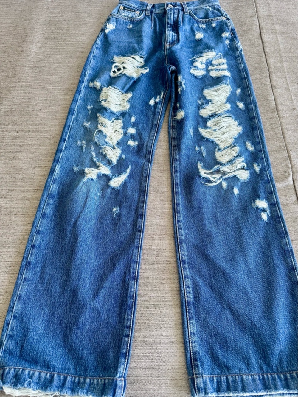 Dolce & Gabbana Blue Denim Jeans with Branded Silver Button, Ripped Style